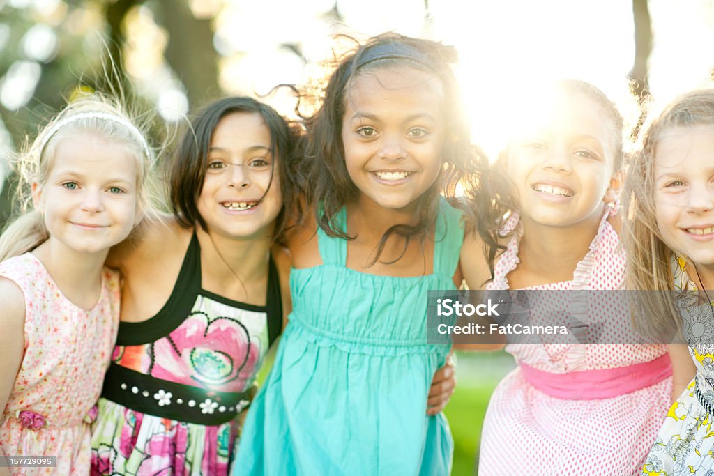 Girls A group of girl friends outside. 6-7 Years Stock Photo