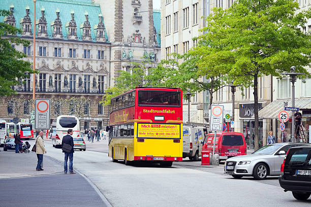 Long Exposure of Blurred Bus Passing Hamburg City Hall