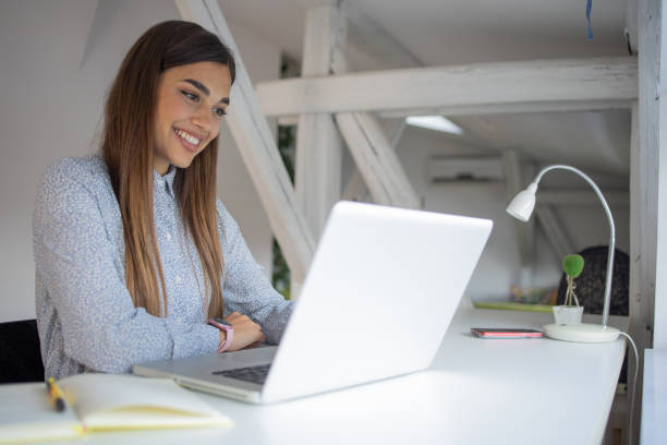 istock Young woman working from home 1577297602