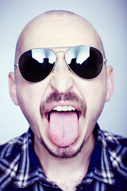 istock Sticking out tongue 157730531