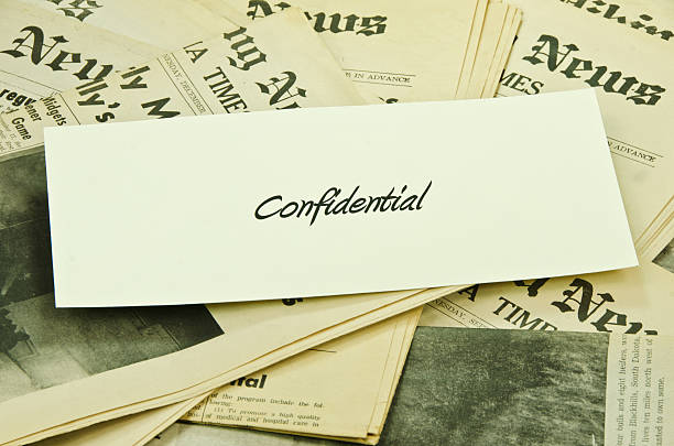 istock Confidential on News Papers Close-up 157731046