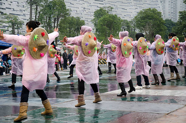 Luannan County, China - February 10, 2025: People dressed in beautiful costumes dance yangko on the square to celebrate the traditional Chinese New Year.