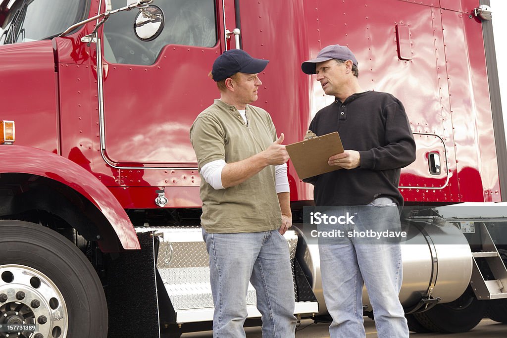 Trucker revisão - Foto de stock de Motorista de Caminhão royalty-free