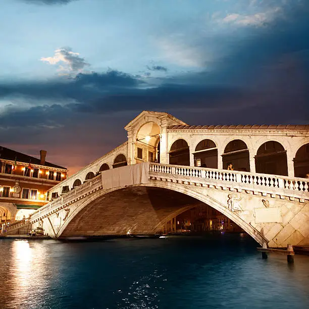 Rialto Bridge in Venice by twilight. See my other photos from Italy:  http://www.oc-photo.net/FTP/icons/italy.jpg