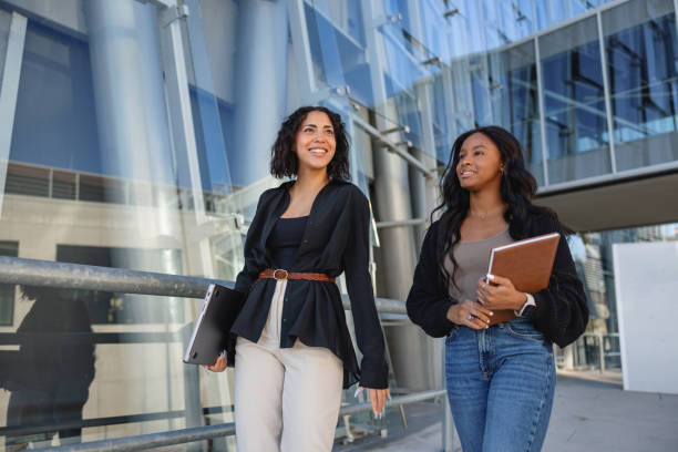 istock Multicultural Friends Having A Good Time On The University Campus 1577316750