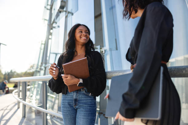 istock Multicultural Friends Having A Good Time On The University Campus 1577316761