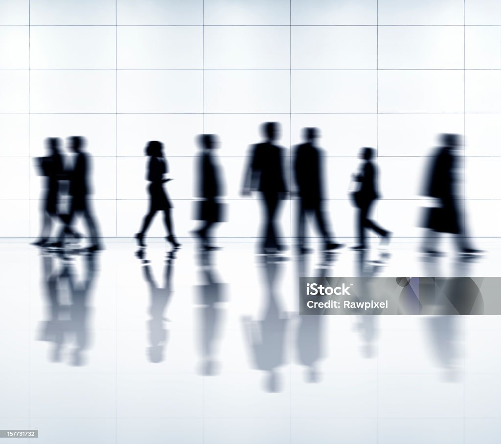 Business People in motion  Asian and Indian Ethnicities Stock Photo