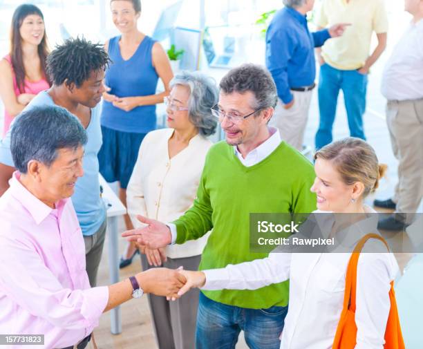 Diverse Adults Talking Together Stock Photo - Download Image Now - Adult, Adults Only, Business