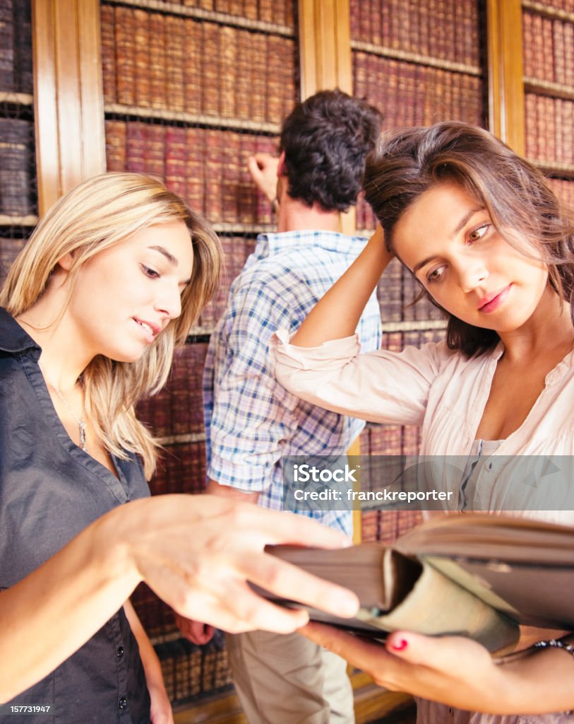 High School student doing a research in library  20-24 Years Stock Photo