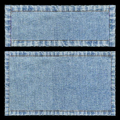 Denim frames background textured isolated on black.