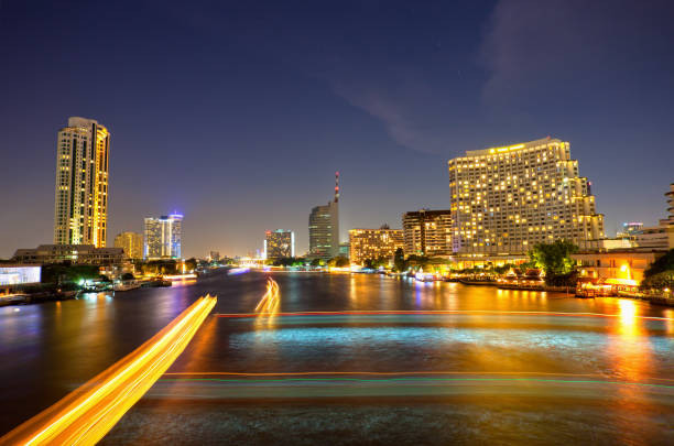istock Boat light trails on Bangkok Chao Phraya river 157731973