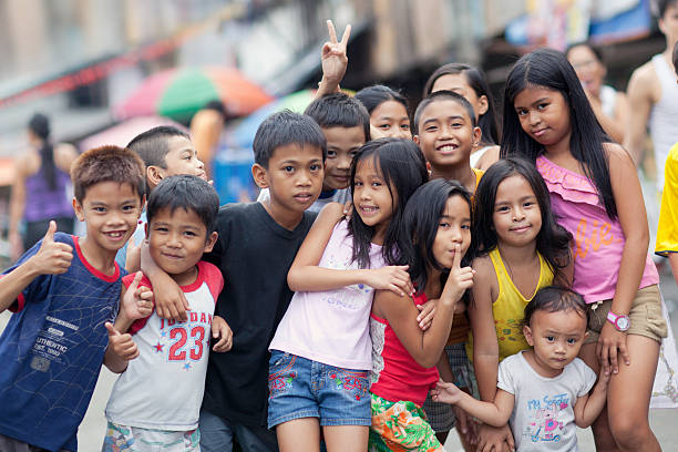 Group of happy kids  filipino family stock pictures, royalty-free photos & images