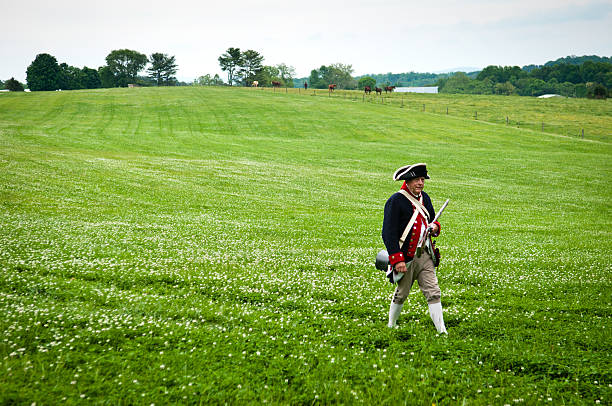 A reenactor portraying a British soldier in JBealls Company of the Maryland Forces during the French and Indian war.  This was a war fought between Great Britain and France in North America from 1754 to 1763.  In Canada, this war might be referred to as the Seven Years' War, although French speakers in Quebec often call it La guerre de la Conquête (\
