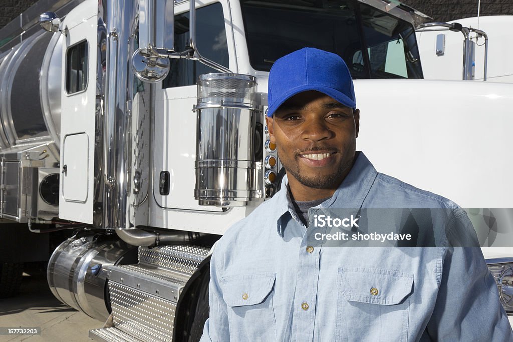 Sorridente camionista - Foto stock royalty-free di Camionista