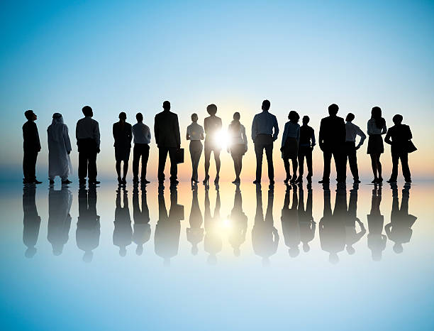 istock Silhouettes of a large business team 157732308