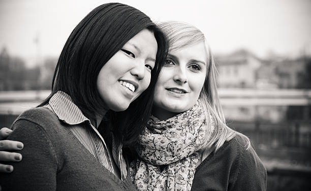 istock Cheerful friends embracing smiling 157732366