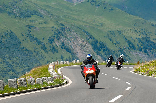 Motor Hill Riding Motorcycle On Highway Stock Photos, Pictures & Royalty-Free Images - iStock