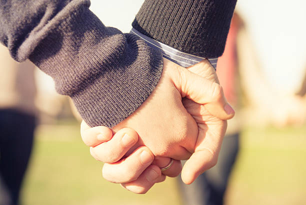 istock Holding hands couple in love 157733013