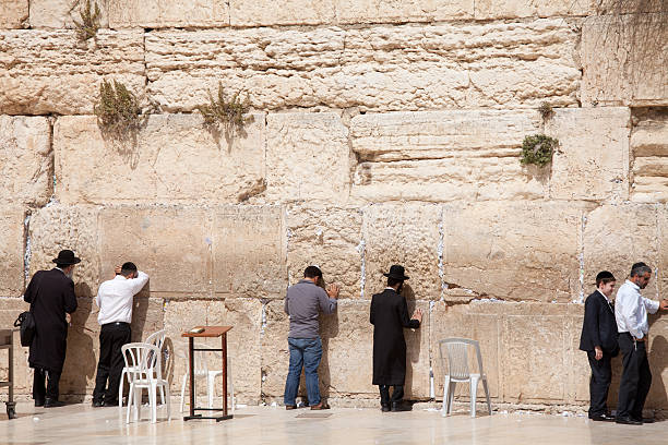 Jerusalem, Israel - May 17, 2012: The Western Wall in Jerusalem, a remnant of the ancient wall of the Temple Mount courtyard, a sacred site of Jewish prayer and pilgrimage.
