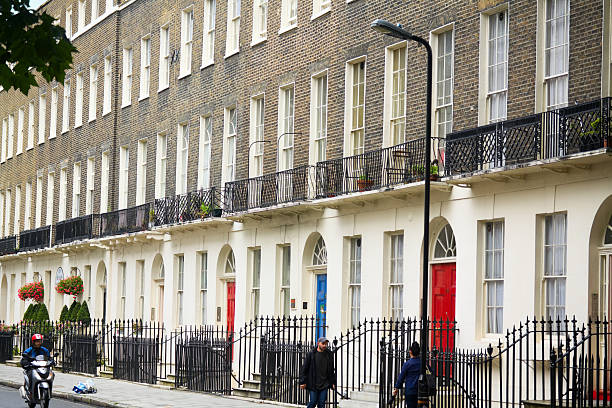 houses on Hillgate Street view built in the Victorian style, with ornate brickwork, bay windows, and decorative cornices at Hillgate Place, Hillgate Village is in Notting Hill and Holland Park, Royal Borough of Kensington and Chelsea, Greater London, United Kingdom.