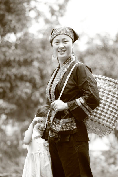 Mother and daughter (woman from chinese yao Tribe)