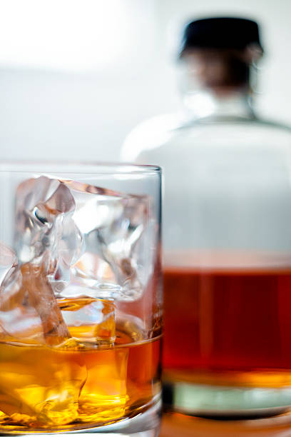 Whiskey in glass with ice