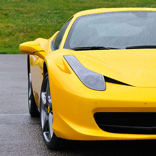 Zandvoort, The Netherlands - June 24, 2012: Yellow Ferrari 458 Italia front view. The car is on display during the 2012 Italia a Zandvoort day.