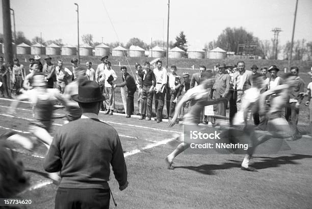 Men Running In High School Track Event 1941 Retro Stock Photo - Download Image Now - Old-fashioned, Retro Style, Running