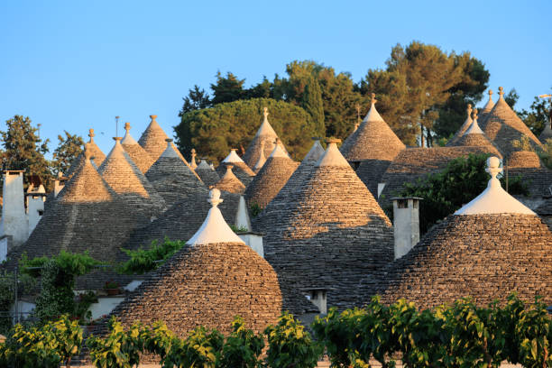 istock Alberobello trulli house rooftops in Italy 1577347970