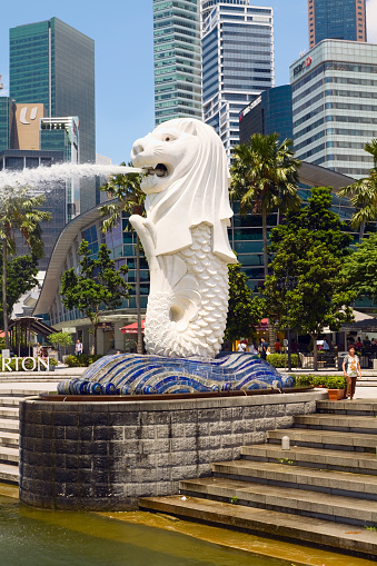 Singapore, Singapore – October 23, 2022: A stunning view of the bay with the lion fountain and Singapore skyline with modern glass skyscrapers