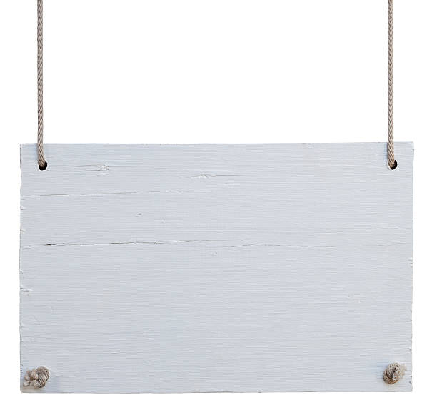 istock Old weathered white wood signboard. 157735626