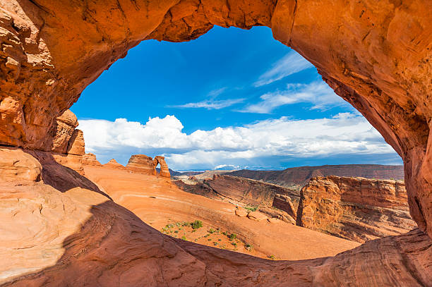 Delicate Arch, Arches National Park Perfect photo of Delicate Arch, Arches National Park with sun shining in the sky. delicate arch stock pictures, royalty-free photos & images