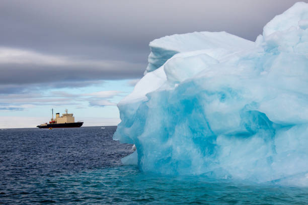 istock Iceberg with reflection drifting in the arctic ozean 157738398