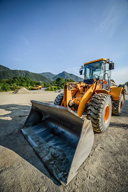 Excavator Excavator. road scraper stock pictures, royalty-free photos & images