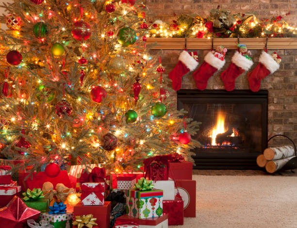 istock Christmas Tree in front of Fireplace 157739698