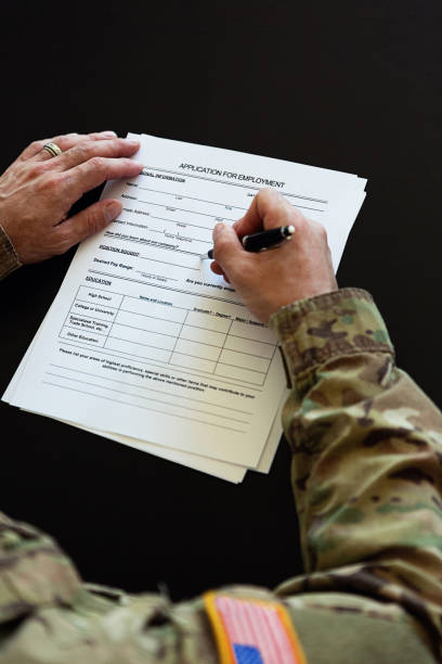 istock Soldier filling out job application form 157739767