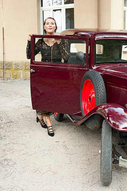 istock Woman at a Vintage Car 157739791