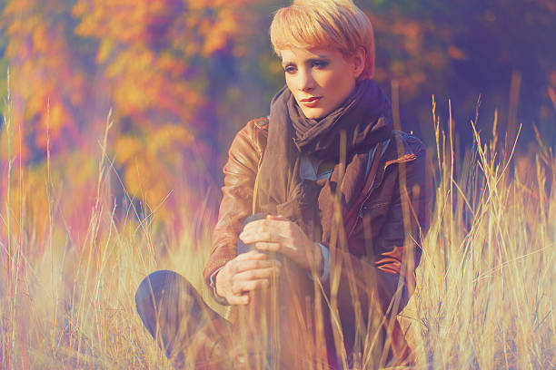 istock Young woman in meadow 157739959