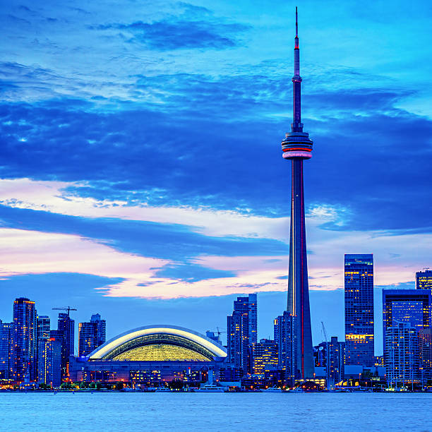 istock Toronto cityscape with CN Tower and baseball stadium at dusk 157740021