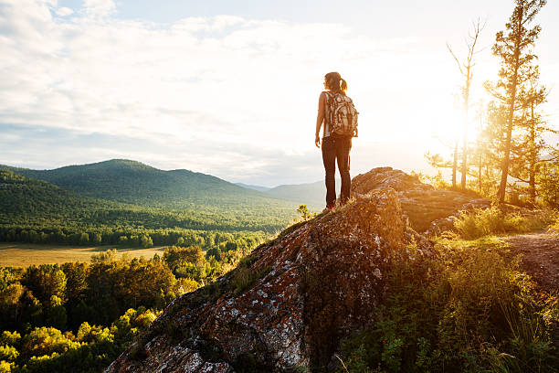 istock young woman trekking 157740336