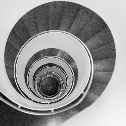 black and white staircase as seen from above