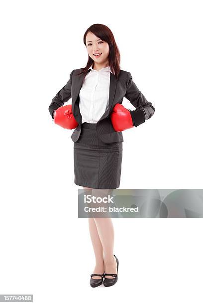 Asian Businesswoman In Boxing Gloves On White Background Stock Photo - Download Image Now