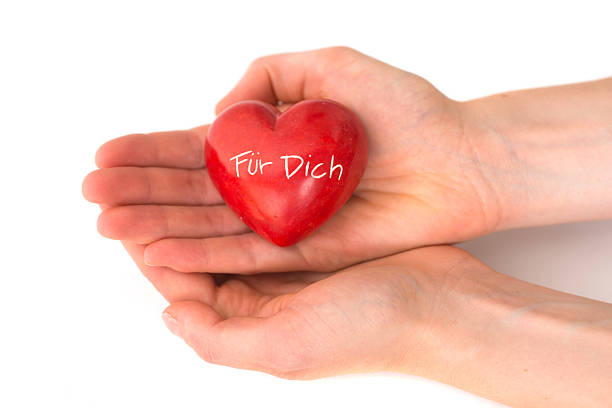 istock heart in human hand - For you 157740687