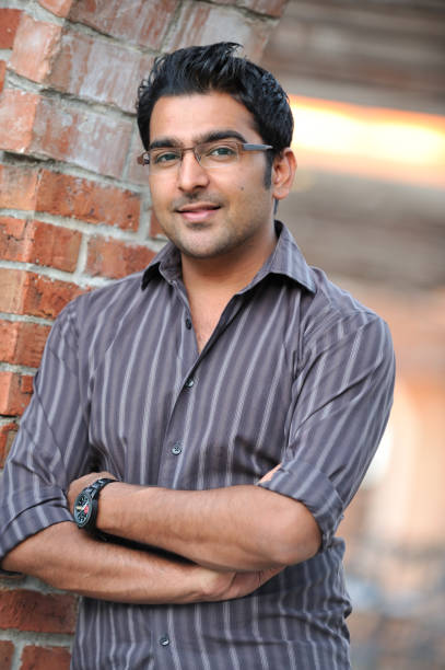 istock Young Pakistani man with arms crossed 157740867