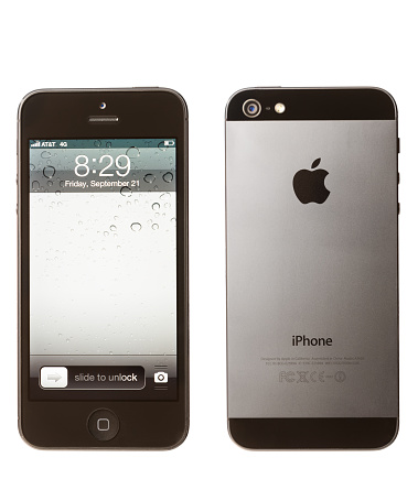 Grand Junction, Colorado - September 21, 2012:New iPhone 5, black version showing front and back of phone composite with lit screen displaying default background isolated on white