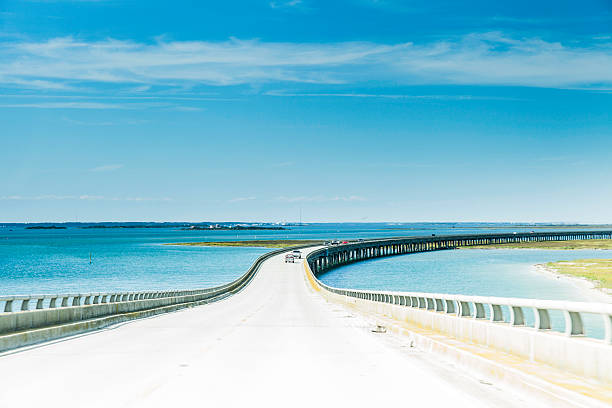 Vehicles Crossing the Bonner Bridge in North Carolina  cape hatteras stock pictures, royalty-free photos & images