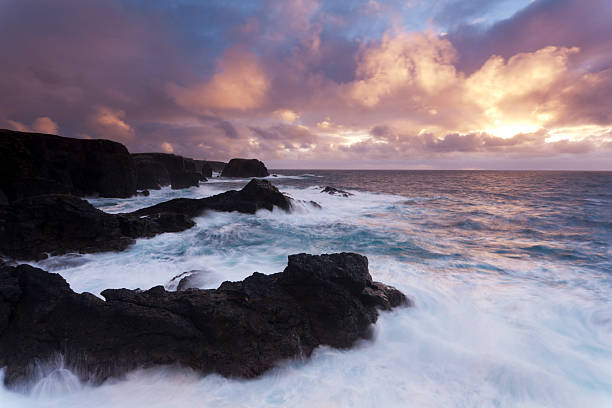 istock Eshaness Shetland at sunset during stormy conditions 157742373
