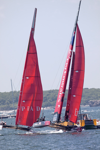 A panoramic shot of a red motorboat in the lake in closeup