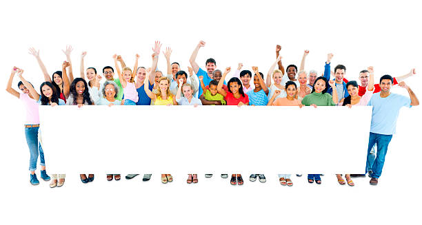 istock A large group of people holding a white blank banner 157742383