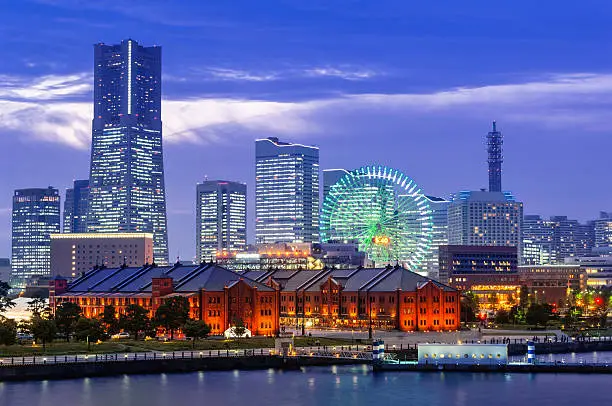 The Yokohama Skyline with the famous Landmark Tower, Queen's Square and the ferries wheel with the Aka-Rengo Soko in foreground.